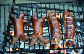 Cervelats auf dem Grill